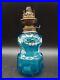 Belle_petite_lampe_a_petrole_Art_Deco_verre_souffle_bleu_emaille_decor_floral_01_yflk