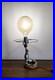 Lampe_Art_deco_figurant_une_otarie_en_bronze_chrome_01_gpc