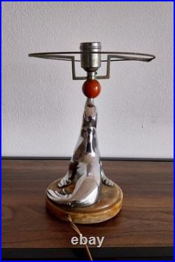 Lampe Art deco figurant une otarie en bronze chromé