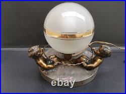 Lampe art deco 1930 ronde d'enfants métal régule doré et patine noire Bel état