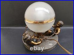 Lampe art deco 1930 ronde d'enfants métal régule doré et patine noire Bel état