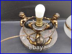 Lampe art deco 1930 ronde d'enfants métal régule doré et patine noire Bel état