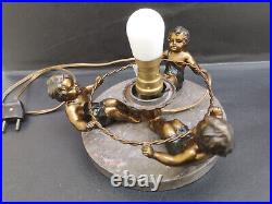 Lampe art deco 1930 ronde d'enfants métal régule doré et patine noire Bel état