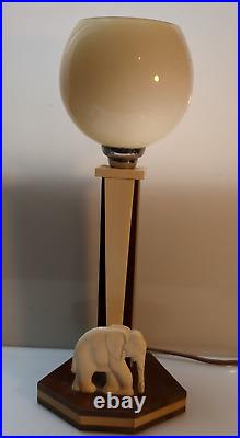 Lampe art deco style africain globe opalin bois vernis pas de marque