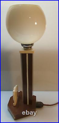Lampe art deco style africain globe opalin bois vernis pas de marque