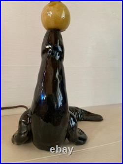 Lampe céramique noire Otarie au ballon jaune Art Déco année 40 XX