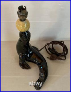 Lampe céramique noire Otarie au ballon jaune Art Déco année 40 XX