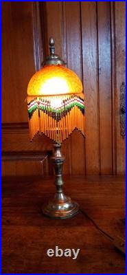 Lampe de table patte de verre bronze et pampilles style Art déco