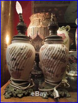 Paire de lampes epoque XIXe en faience et bronze decor floral