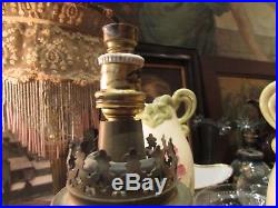 Paire de lampes epoque XIXe en faience et bronze decor floral