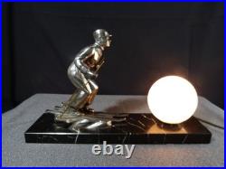 Sculpture statue lampe ancienne art déco régule skieur ski sport d'hivers globe