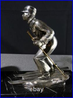 Sculpture statue lampe ancienne art déco régule skieur ski sport d'hivers globe