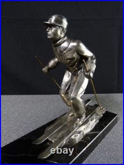 Sculpture statue lampe ancienne art déco régule skieur ski sport d'hivers globe