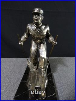 Sculpture statue lampe ancienne art déco régule skieur ski sport d'hivers globe
