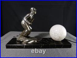 Sculpture statue lampe ancienne art déco régule skieur ski sport d'hivers globe