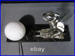 Sculpture statue lampe ancienne art déco régule skieur ski sport d'hivers globe